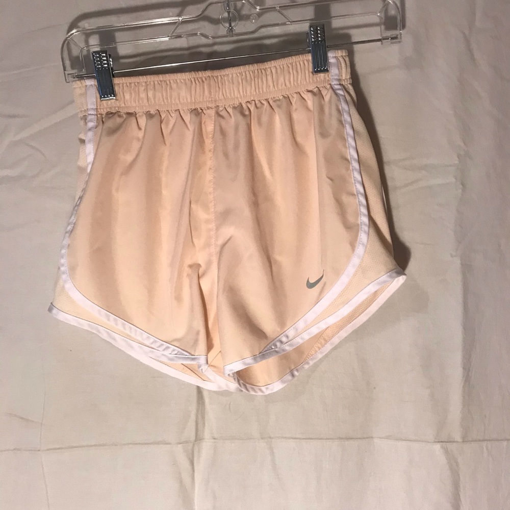 Peach Nike shorts